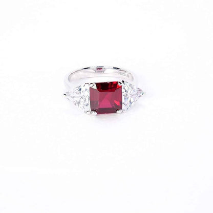 ANELLO CON PIETRA CENTRALE E TRIANGOLI LATERALI