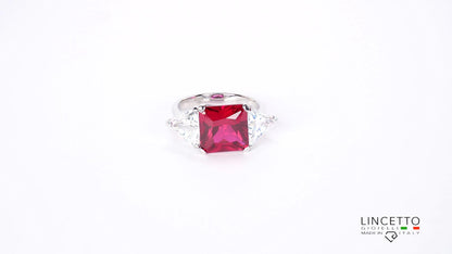 ANELLO CON PIETRA CENTRALE 10X10 E TRIANGOLI LATERALI