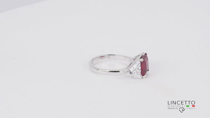 RING WITH CENTRAL STONE AND SIDE TRIANGLES