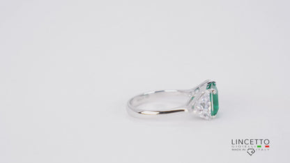 RING WITH CENTRAL STONE AND SIDE TRIANGLES